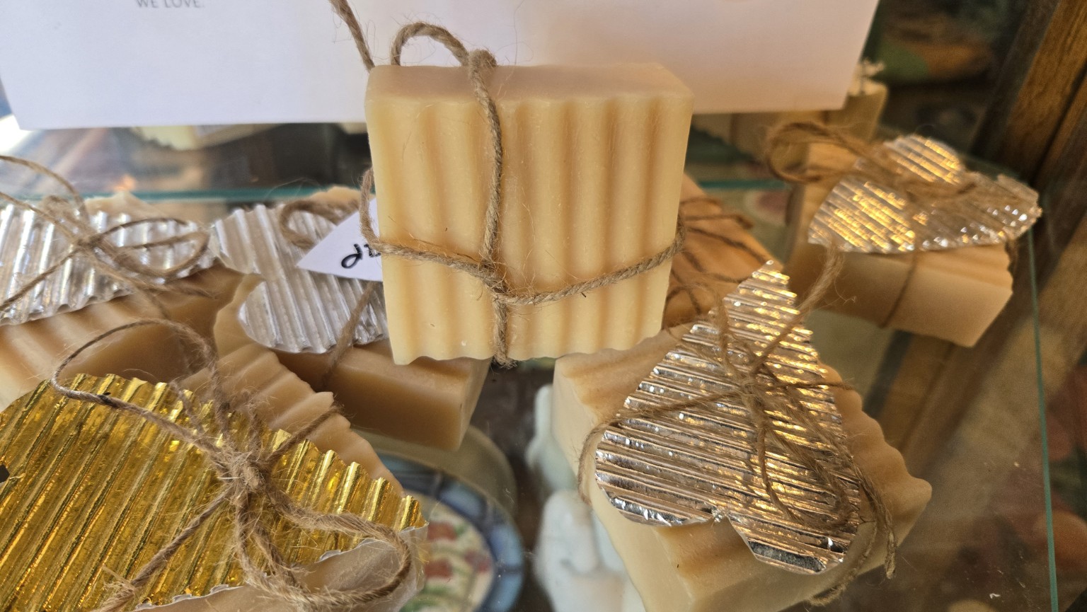 Rose-scented Besso Ranch goat milk soap bars tied with twine